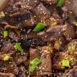 Beef teriyaki with sesame seeds in a bowl