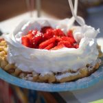 funnel cake with strawberries at the center