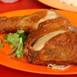 delicious fried chicken on a orange plate