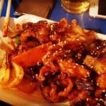 spicy chicken feet on a chopping board