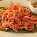nilasing na hipon on a white plate with sauce