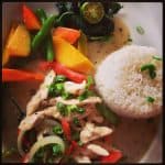 chicken bicol express on a plate with rice